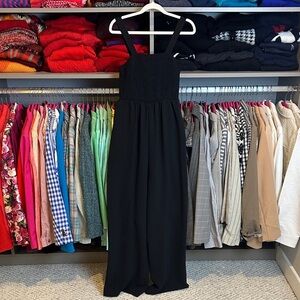 Dokotoo black smocked 2 pocket wide leg jumpsuit size S